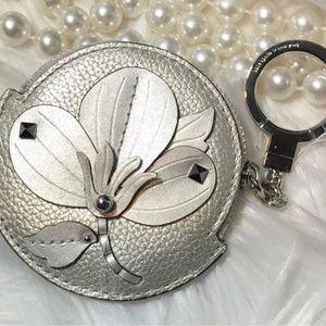 Kate Spade key chain new with tag in plastic.